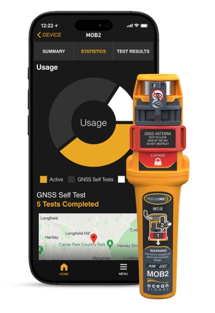 Ocean Signal MOB2 with smartphone displaying its companion app usage and test results screen.